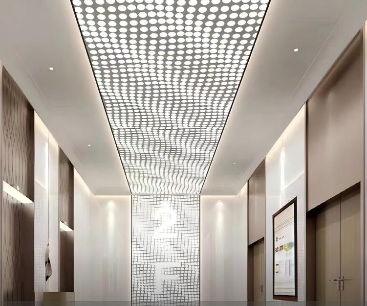 Perforated gypsum board ceiling in a modern interior space Perforated gypsum board ceiling in a modern interior space